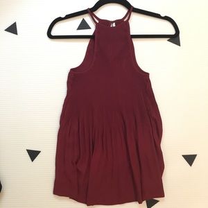 Maroon flowy racerback tank top.